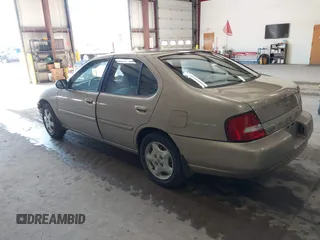 2001 Nissan Altima GXE with VIN 1N4DL01D91C128284, listed as a IAAI auction lot 41649006 with 75,262 mi miles. Bid and sale history available at carsss.com. Image 3.