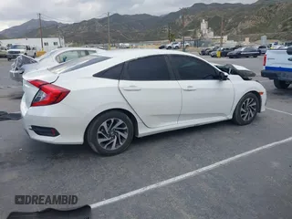 2018 Honda Civic EX with VIN 19XFC2F76JE206191, listed as a IAAI auction lot 41949231 with 146,118 mi miles and . Bid and sale history available at DreamBid. Image 13.