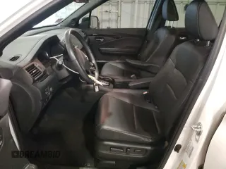 2020 Honda Passport Touring z VIN 5FNYF8H9XLB008647, wystawiony jako Copart lot #73320804 z przebiegiem 70 068 mil mil oraz Szkoda całkowita • Salvage title. Historia ofert i sprzedaży dostępna na DreamBid. Obrazek 7.