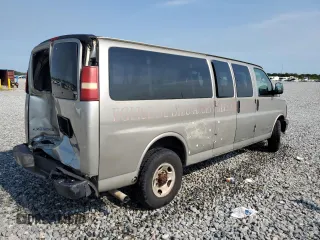 2004 Chevrolet Express Passenger with VIN 1GAHG39U741128458, listed as a Copart auction lot 64436215 with 118,387 mi miles and Salvage title. Bid and sale history available at DreamBid. Image 3.