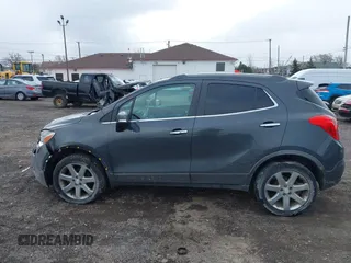 2016 Buick Encore Leather with VIN KL4CJGSB8GB545762, listed as a IAAI auction lot 41957024 with 142,216 mi miles and . Bid and sale history available at carsss.com. Image 15.