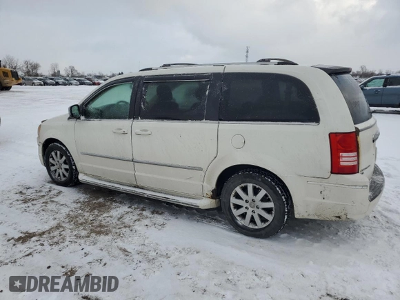 2009 Chrysler Town & Country Touring with VIN 2A8HR54X39R703438, listed as a Copart auction lot 86143644 with 254,748 mi miles and Clean Title. Bid and sale history available at DreamBid. Image 2.