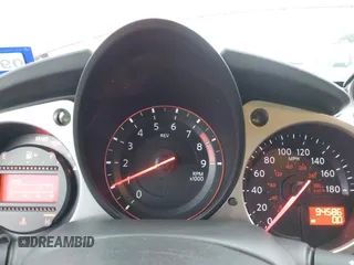 2016 Nissan 370Z z VIN JN1AZ4EHXGM932681, wystawiony jako IAAI lot #42350850 z przebiegiem 94 586 mil mil oraz . Historia ofert i sprzedaży dostępna na DreamBid. Obrazek 7.