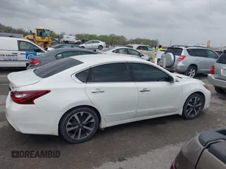 2017 Nissan Altima SR with VIN 1N4AL3AP0HN345977, listed as a IAAI auction lot 41937530 with 121,292 mi miles and . Bid and sale history available at carsss.com. Image 13.