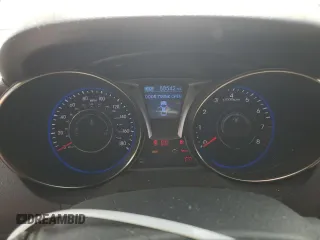 2013 Hyundai Genesis Coupe R-Spec z VIN KMHHU6KJ9DU097094, wystawiony jako Copart lot #60881695 z przebiegiem 88 542 mil mil oraz Szkoda całkowita • Salvage title. Historia ofert i sprzedaży dostępna na DreamBid. Obrazek 9.