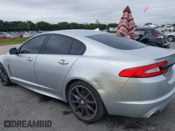 2015 Jaguar XF V6 Portfolio with VIN SAJWA0F79F8U77985, listed as a IAAI auction lot 41386030 with 81,335 mi miles. Bid and sale history available at carsss.com. Image 6.