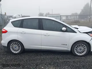 2013 Ford C-Max Hybrid SE with VIN 1FADP5AU3DL529867, listed as a IAAI auction lot 41725293 with 95,071 mi miles. Bid and sale history available at carsss.com. Image 13.