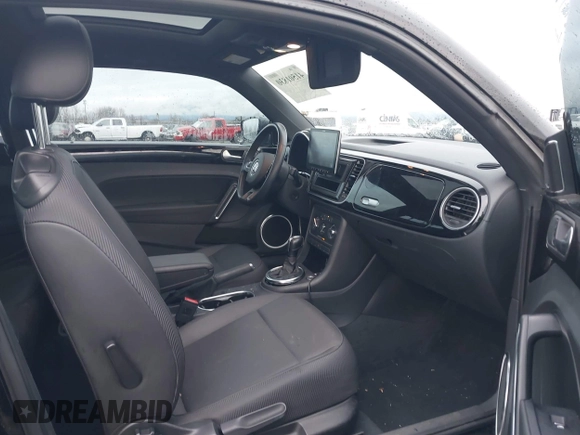 2014 Volkswagen Beetle 2.5L w/Sun with VIN 3VWJP7AT3EM608906, listed as a IAAI auction lot 41501830 with 42,804 mi miles and . Bid and sale history available at DreamBid. Image 5.
