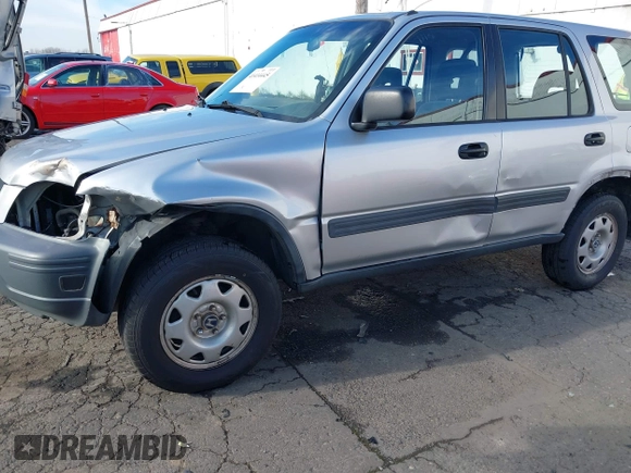 2000 Honda CR-V LX with VIN JHLRD184XYC054038, listed as a IAAI auction lot 41414445 with 294,210 mi miles. Bid and sale history available at carsss.com. Image 6.