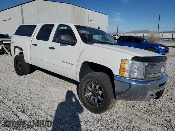 2013 Chevrolet Silverado 1500 LT with VIN 3GCPKSE72DG230652, listed as a Copart auction lot 83632464 with 121,411 mi miles and Salvage Title. Bid and sale history available at DreamBid. Image 4.