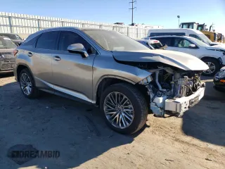 2022 Lexus RX with VIN 2T2JZMAA7NC257707, listed as a Copart auction lot 83791524 with 31,965 mi miles and Salvage Title. Bid and sale history available at carsss.com. Image 4.