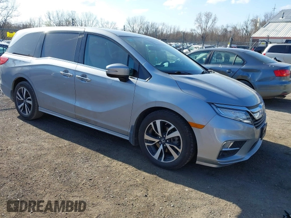 2018 Honda Odyssey Elite z VIN 5FNRL6H91JB070355, wystawiony jako IAAI lot #41975916 z przebiegiem 147 022 mil mil oraz . Historia ofert i sprzedaży dostępna na DreamBid. Obrazek 1.