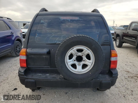 2000 Chevrolet Tracker z VIN 2CNBE13C4Y6920783, wystawiony jako Copart lot #82619854 z przebiegiem 96 620 mil mil oraz Czysty tytuł • Clean title. Historia ofert i sprzedaży dostępna na DreamBid. Obrazek 6.