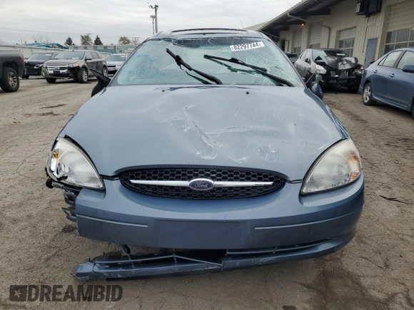 2000 Ford Taurus SEL with VIN 1FAFP56S2YG160062, listed as a Copart auction lot 82297744 with 97,218 mi miles and Salvage title. Bid and sale history available at DreamBid. Image 5.