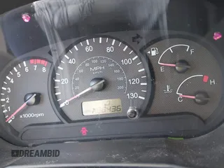 2004 Hyundai Accent GL with VIN KMHCG45C14U547954, listed as a IAAI auction lot 41350219 with 138,436 mi miles. Bid and sale history available at carsss.com. Image 7.