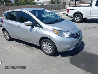 2015 Nissan Note SV z VIN 3N1CE2CP4FL409975, wystawiony jako IAAI lot #42569579 z przebiegiem 122 714 mil mil oraz . Historia ofert i sprzedaży dostępna na DreamBid. Obrazek 1.