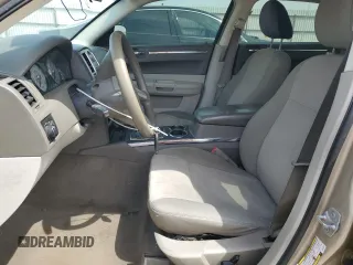 2009 Chrysler 300 LX with VIN 2C3KA43D39H553539, listed as a Copart auction lot 53302985 with 179,834 mi miles and Salvage Title. Bid and sale history available at DreamBid. Image 7.