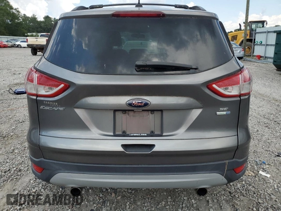 2013 Ford Escape SE z VIN 1FMCU9GX3DUB89486, wystawiony jako Copart lot #62277105 z przebiegiem 108 360 mil mil oraz Czysty tytuł • Clean title. Historia ofert i sprzedaży dostępna na DreamBid. Obrazek 6.