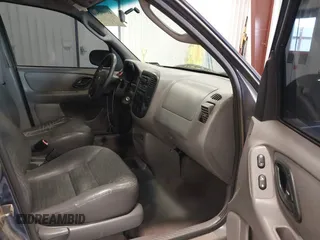 2002 Ford Escape XLS Choice with VIN 1FMYU02142KA16248, listed as a IAAI auction lot 41900344 with 203,427 mi miles and . Bid and sale history available at DreamBid. Image 5.