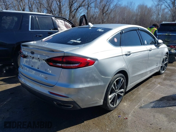 2019 Ford Fusion Titanium with VIN 3FA6P0D91KR187109, listed as a IAAI auction lot 41646320 with 107,125 mi miles. Bid and sale history available at carsss.com. Image 4.