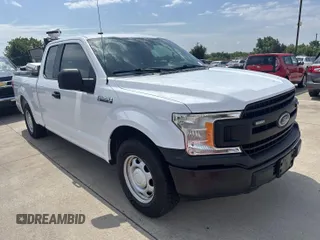 2019 Ford F-150 XL z VIN 1FTEX1C51KKC92425, wystawiony jako IAAI lot #42526412 z przebiegiem 150 373 mil mil oraz . Historia ofert i sprzedaży dostępna na DreamBid. Obrazek 21.