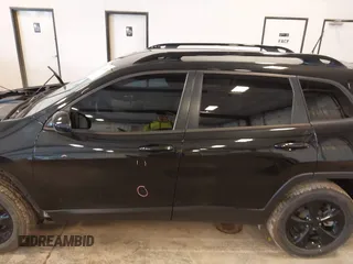 2016 Jeep Cherokee Latitude with VIN 1C4PJMCS6GW214045, listed as a IAAI auction lot 42440361 with 115,863 mi miles and . Bid and sale history available at DreamBid. Image 14.