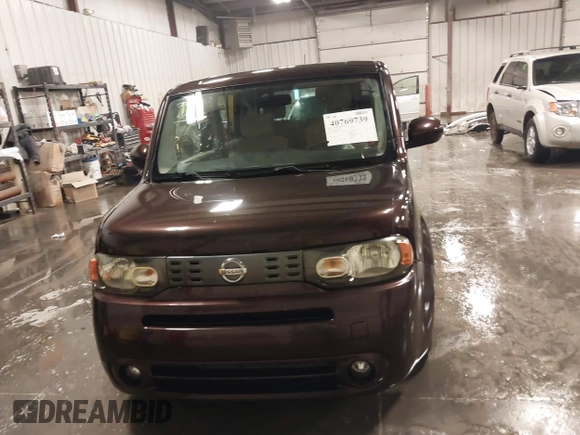 2009 Nissan Cube S z VIN JN8AZ28R39T124465, wystawiony jako IAAI lot #40769739 z przebiegiem 145 993 mil mil oraz . Historia ofert i sprzedaży dostępna na DreamBid. Obrazek 12.