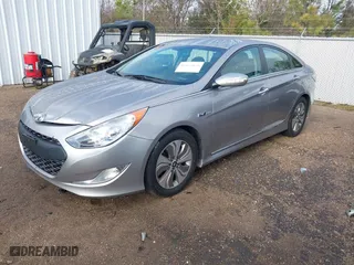 2013 Hyundai Sonata Hybrid with VIN KMHEC4A41DA092477, listed as a IAAI auction lot 41453656 with 124,804 mi miles. Bid and sale history available at carsss.com. Image 2.
