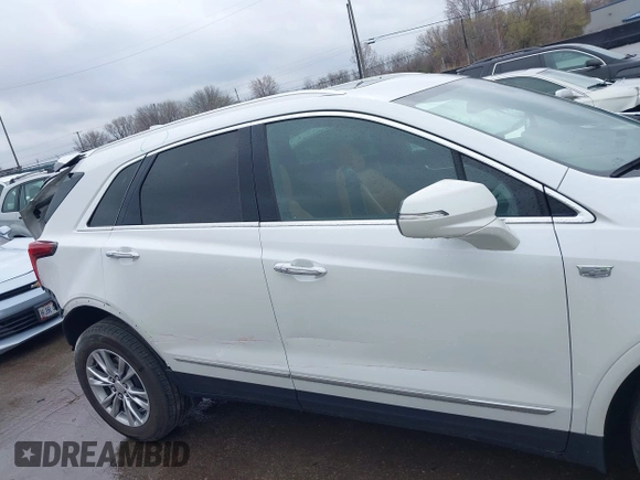 2023 Cadillac XT5 AWD Premium Luxury with VIN 1GYKNDR43PZ102819, listed as a IAAI auction lot 42007060 with 16,606 mi miles and . Bid and sale history available at DreamBid. Image 13.