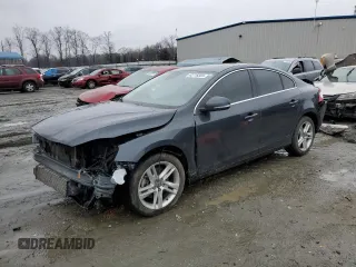 2015 Volvo S60 T5 Drive-E Premier Plus with VIN YV140MFC7F1309794, listed as a Copart auction lot 42718355 with 0 mi miles and Salvage Title. Bid and sale history available at carsss.com. Image 1.