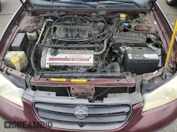 2001 Nissan Maxima GXE z VIN JN1CA31D91T831187, wystawiony jako Copart lot #72222434 z przebiegiem 138 438 mil mil oraz Szkoda całkowita • Salvage title. Historia ofert i sprzedaży dostępna na DreamBid. Obrazek 11.