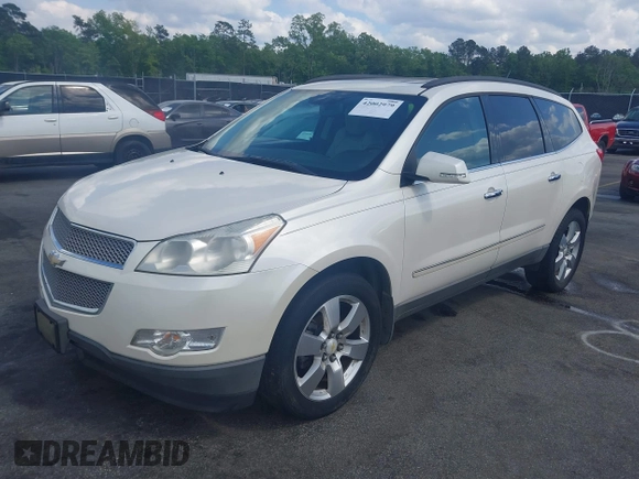 2011 Chevrolet Traverse LTZ with VIN 1GNKVLED5BJ167465, listed as a IAAI auction lot 42002979 with 167,271 mi miles and . Bid and sale history available at DreamBid. Image 18.