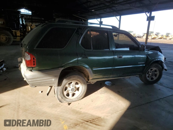 2002 Isuzu Rodeo z VIN 4S2CK58DX24320793, wystawiony jako Copart lot #46357065 z przebiegiem 180 306 mil mil oraz Szkody całkowita. Historia ofert i sprzedaży dostępna na DreamBid. Obrazek 3.