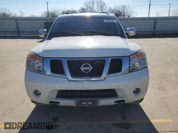 2015 Nissan Armada SV z VIN 5N1BA0ND8FN616053, wystawiony jako Copart lot #88253385 z przebiegiem 211 004 mil mil oraz Szkoda całkowita • Salvage title. Historia ofert i sprzedaży dostępna na DreamBid. Obrazek 5.