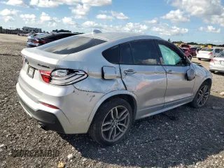 2017 BMW X4 M40i with VIN 5UXXW7C51H0U25511, listed as a Copart auction lot 77492894 with 94,003 mi miles and Salvage Title. Bid and sale history available at carsss.com. Image 3.