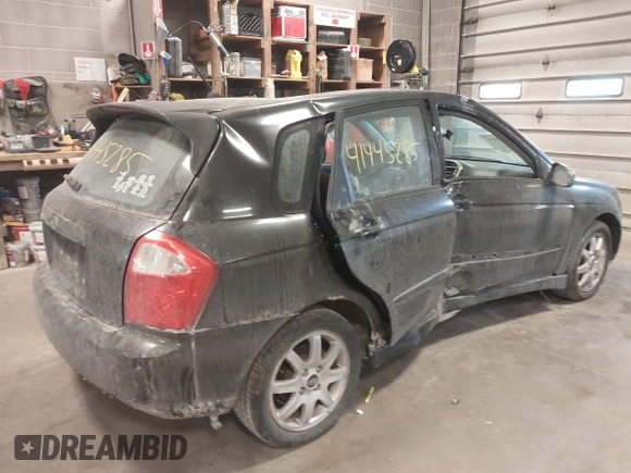 2005 Kia Spectra with VIN KNAFE161255083357, listed as a IAAI auction lot 41445285 with 90,349 mi miles. Bid and sale history available at carsss.com. Image 6.