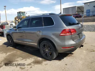 2013 Volkswagen Touareg Sport с VIN WVGEP9BP0DD010408, выставлен на аукционе Copart как лот 75854084 с пробегом 159 863 миль миль и Списание • Salvage title. История ставок и продаж доступна на DreamBid. Изображение 2.