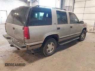 1999 Chevrolet Tahoe Z71 with VIN 1GNEK13R7XJ577796, listed as a IAAI auction lot 41036617 with 231,795 mi miles and . Bid and sale history available at DreamBid. Image 4.