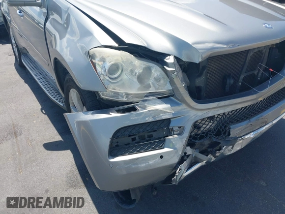 2012 Mercedes-Benz GL 450 z VIN 4JGBF7BE1CA800793, wystawiony jako IAAI lot #42312472 z przebiegiem 155 847 mil mil oraz . Historia ofert i sprzedaży dostępna na DreamBid. Obrazek 6.