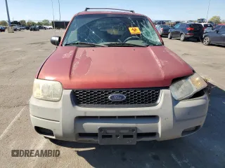 2001 Ford Escape XLS with VIN 1FMYU021X1KA95701, listed as a Copart auction lot 76782574 with 139,174 mi miles and Salvage Title. Bid and sale history available at carsss.com. Image 5.
