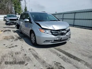 2016 Honda Odyssey SE with VIN 5FNRL5H36GB144433, listed as a Copart auction lot 48898755 with 192,442 mi miles and Salvage Title. Bid and sale history available at DreamBid. Image 11.