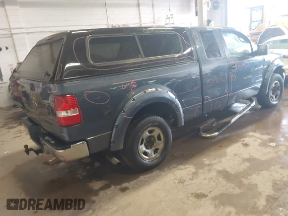 2005 Ford F-150 XLT with VIN 1FTPX14555NA01757, listed as a IAAI auction lot 41935980 with 145,311 mi miles. Bid and sale history available at carsss.com. Image 4.