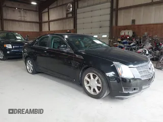2008 Cadillac CTS AWD z VIN 1G6DH577780191604, wystawiony jako IAAI lot #42506015 z przebiegiem 137 958 mil mil oraz . Historia ofert i sprzedaży dostępna na DreamBid. Obrazek 1.