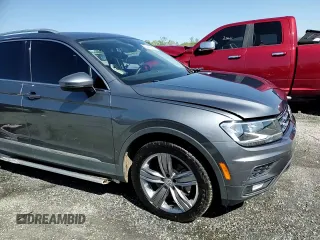 2020 Volkswagen Tiguan SE z VIN 3VV3B7AX8LM102502, wystawiony jako Copart lot #52428635 z przebiegiem 50 778 mil mil oraz Szkody całkowita. Historia ofert i sprzedaży dostępna na DreamBid. Obrazek 14.