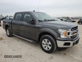 2020 Ford F-150 XL with VIN 1FTEW1CB1LKD56067, listed as a Copart auction lot 87887395 with 106,980 mi miles and Salvage Title. Bid and sale history available at carsss.com. Image 4.