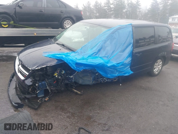 2016 Dodge Grand Caravan SE with VIN 2C4RDGBG3GR258639, listed as a IAAI auction lot 41687082 with 99,616 mi miles and . Bid and sale history available at DreamBid. Image 20.