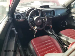 2014 Volkswagen Beetle Turbo R-Line with VIN 3VWVT7AT0EM656599, listed as a Copart auction lot 86358334 with 66,050 mi miles and Salvage Title. Bid and sale history available at DreamBid. Image 8.
