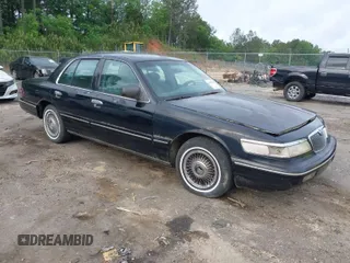 1997 Mercury Grand Marquis GS z VIN 2MELM74W0VX611405, wystawiony jako IAAI lot #42039192 z przebiegiem 273 621 mil mil oraz . Historia ofert i sprzedaży dostępna na DreamBid. Obrazek 1.