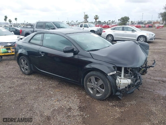 2012 Kia Forte Koup EX with VIN KNAFU6A24C5595313, listed as a IAAI auction lot 41794402 with 132624 miles. Bid and sale history available at carsss.com. Image 1.