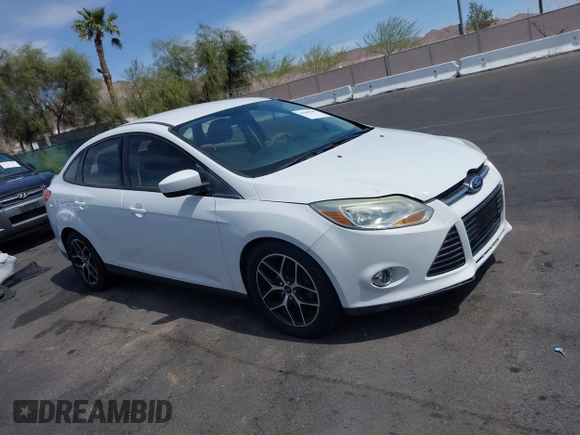 2012 Ford Focus SE with VIN 1FAHP3F24CL462319, listed as a IAAI auction lot 41981509 with 124,831 mi miles. Bid and sale history available at carsss.com. Image 13.